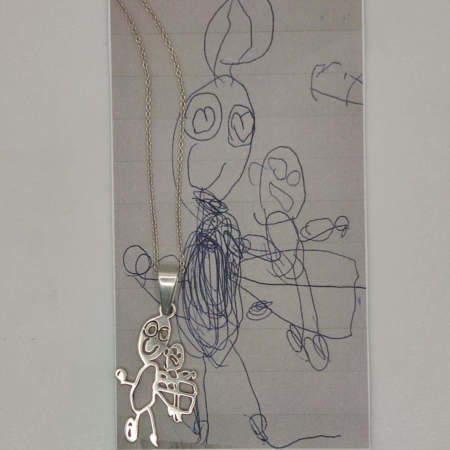 Silver pendant with custom design